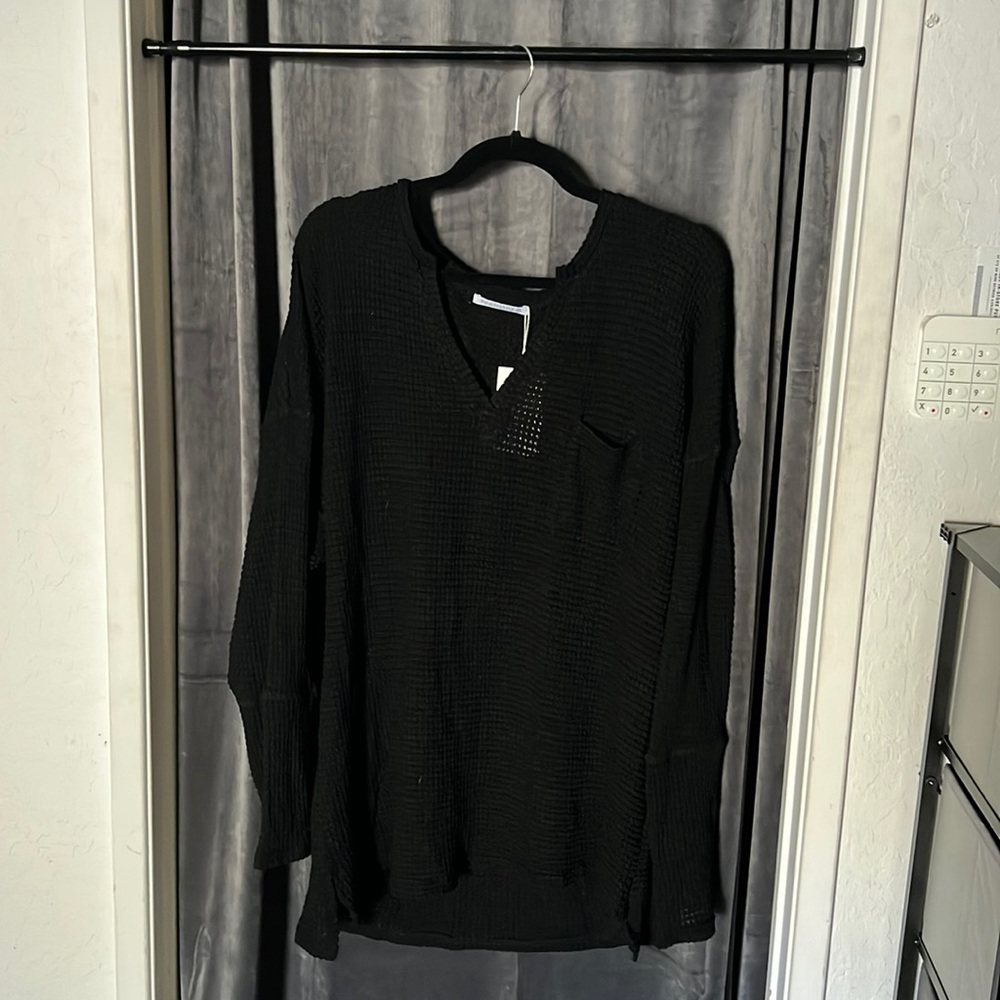 Women’s off the shoulder long sleeve black shirt